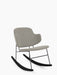 An angled view of The Penguin Rocking Chair, fully upholstered in light grey Re-wool 218 fabric with a black steel frame.