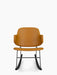 The Penguin Rocking Chair, fully upholstered in tan leather, shown from the front, with a black steel frame and rockers.