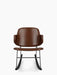 Front view of The Penguin Rocking Chair, fully upholstered in brown Dakar leather with a black steel frame and black rockers.