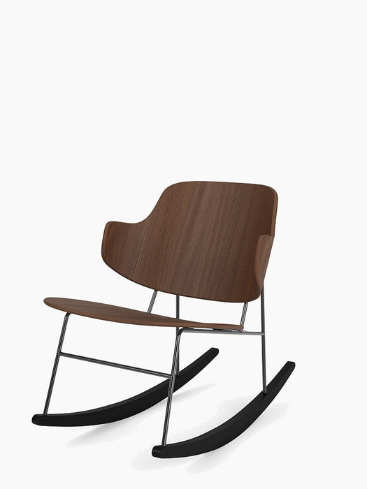The Penguin Rocking Chair in walnut with a black metal frame and rockers, pictured at an angle against a white background.
