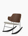 The Penguin Rocking Chair with a walnut backrest and light grey upholstered seat, on a black metal frame with black rockers.