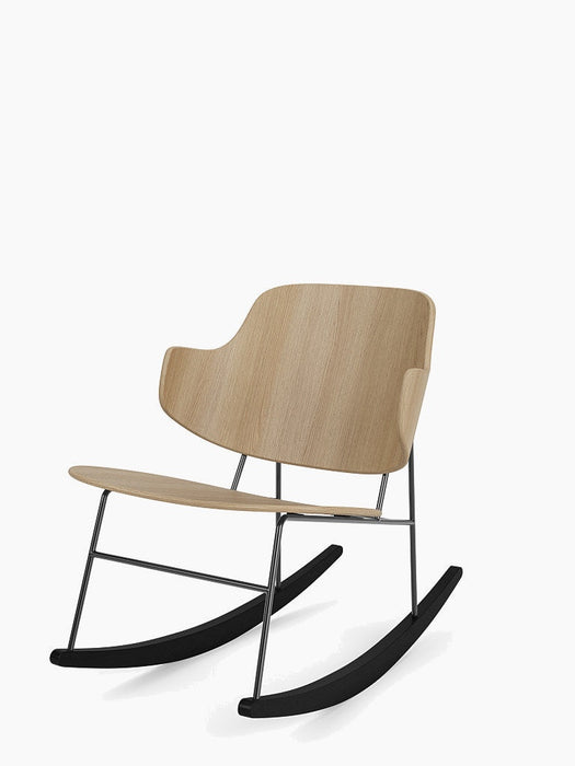 The Penguin Rocking Chair with a natural oak seat and backrest, set on a slender black steel frame with black rockers