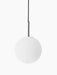 Front view of the TR Bulb, Pendant light. It has a spherical white opal glass shade, polished steel fixture & black cord.