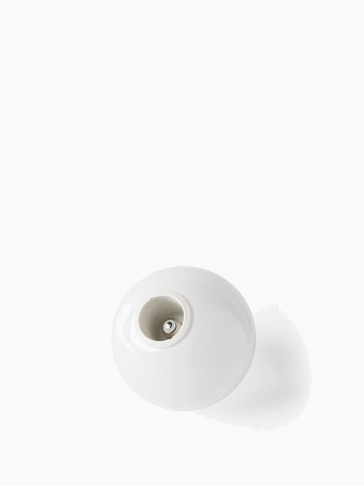 A single, spherical TR Bulb in shiny opal glass, viewed from above on a white background, showing the E27 socket fitting.