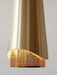 A close-up of the Umanoff Pendant, showing the brushed brass shade with a curved cutout revealing a perforated inner layer.