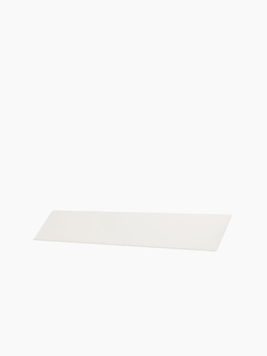 The ivory-coloured Zet Storage System Magazine Shelf, pictured at an angle on a plain white background.