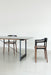 Brut Dining Table american anthracite black glass grey smoked walnut - ambient