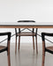 Brut Dining Table american anthracite black glass grey smoked walnut - ambient