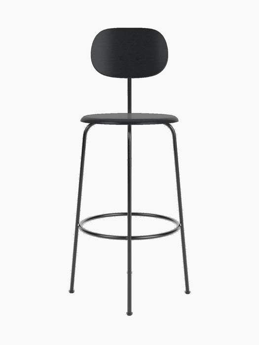 A black Afteroom Bar Chair Plus, Veneer, viewed from the front, with a thin metal frame and a wooden seat.