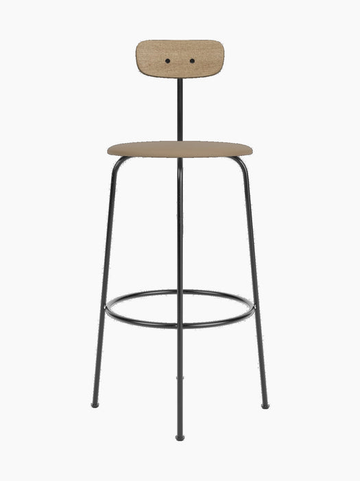 A front view of the Afteroom Bar Chair, showing its black steel frame, upholstered beige seat and natural oak backrest.