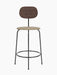 Front view of the Afteroom Counter Chair Plus in dark stained oak with a beige bouclé seat and black metal frame.