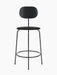 Front view of the Afteroom Counter Chair Plus, Seat Upholstered, in black with a thin metal frame and a wide wood backrest.