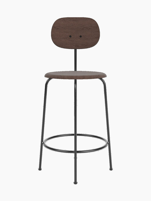 A front-on studio shot of the Afteroom Counter Chair Plus, Veneer in dark stained oak with a black powder-coated steel frame.