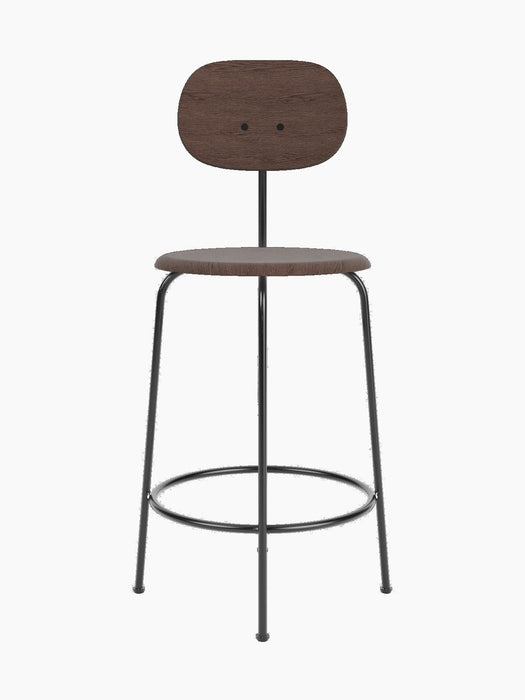 A front-on studio shot of the Afteroom Counter Chair Plus, Veneer in dark stained oak with a black powder-coated steel frame.