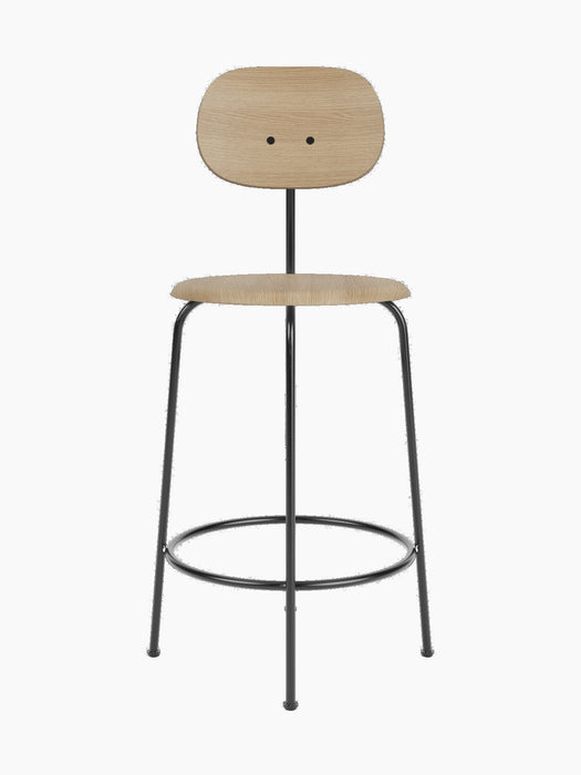 Afteroom Counter Chair Plus with a natural oak seat and backrest, set on a slender black powder-coated frame.