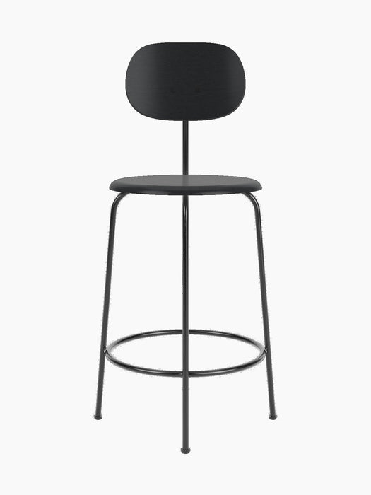 Front view of the minimalist Afteroom Counter Chair Plus in black painted oak with a slender black powder-coated steel frame.