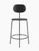 Front view of the minimalist Afteroom Counter Chair Plus in black painted oak with a slender black powder-coated steel frame.