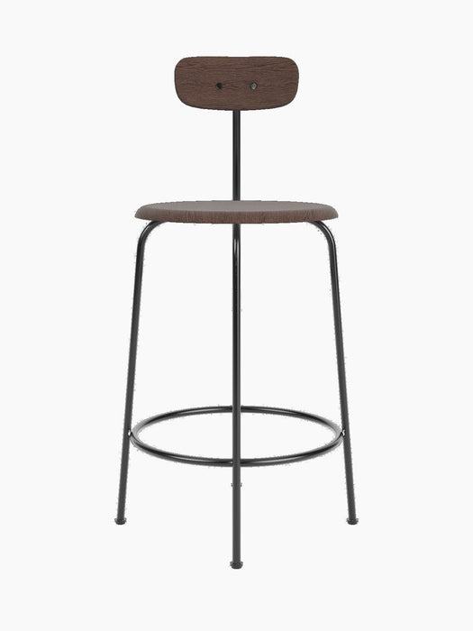 Front view of the Afteroom Counter Chair in dark stained oak veneer, showing its slim black steel frame and wooden seat.