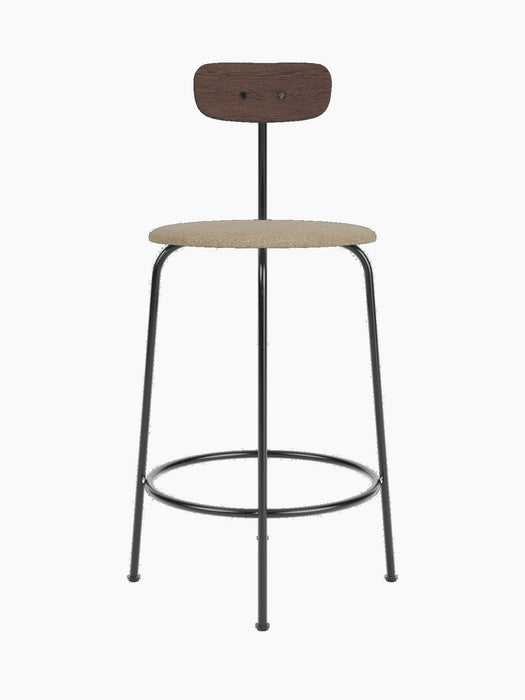 Front view of the Afteroom Counter Chair with a dark stained oak backrest, a beige bouclé seat, and a thin black steel frame.