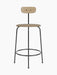 A front view of the Afteroom Counter Chair in natural oak with a tan upholstered seat and black powder-coated steel frame.