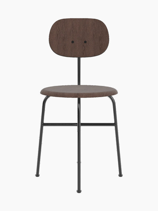 Front view of the Afteroom Dining Chair Plus in dark stained oak veneer with a black steel frame on a black background.