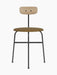 Front view of the Afteroom Dining Chair with a black frame, round brown upholstered seat, and a natural oak wood backrest.