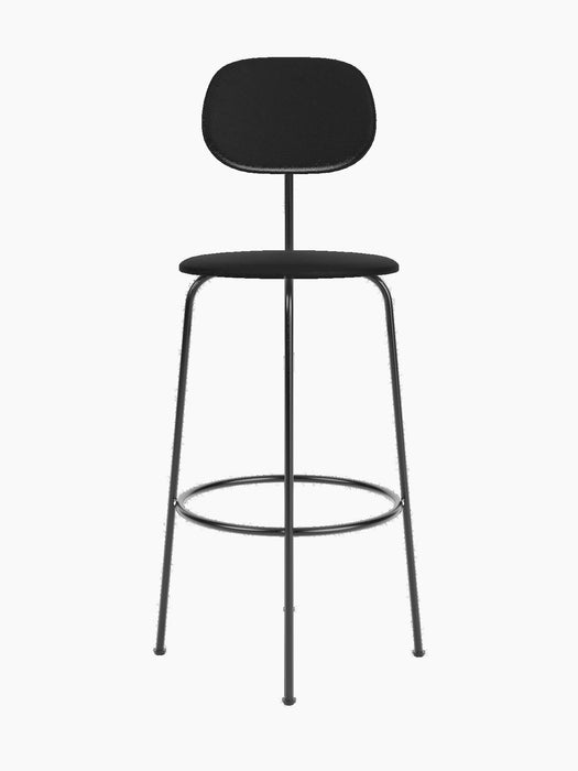 The black Afteroom Bar Chair Plus, Fully Upholstered, front view. It has a slim metal frame, round seat, and oval back.