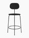 A black Afteroom Counter Chair Plus with a textured, upholstered round seat and wide backrest, on a thin black metal frame.