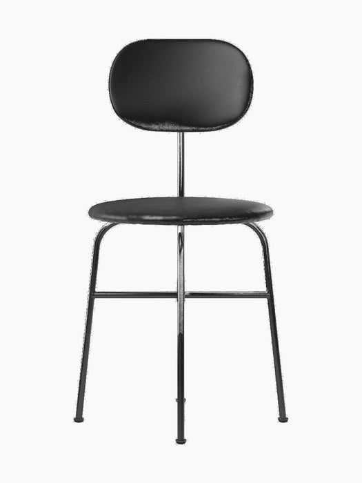 Front view of the Afteroom Dining Chair Plus, fully upholstered in black with a thin tubular steel frame.