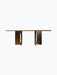 Front view of the Androgyne Rectangular Dining Table in dark stained oak, showing its wide, sculptural legs and long top.