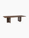 Angled view of the rectangular Androgyne Dining Table in dark stained oak, showing sculptural legs with large oval cut-outs.