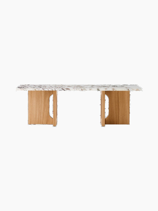 Front view of the Androgyne Lounge Table with a Calacatta Viola marble top and two natural oak legs with cutout details.