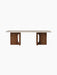 Front view of the Androgyne Lounge Table, featuring a rectangular Kunis Breccia stone top resting on a dark walnut wood base.