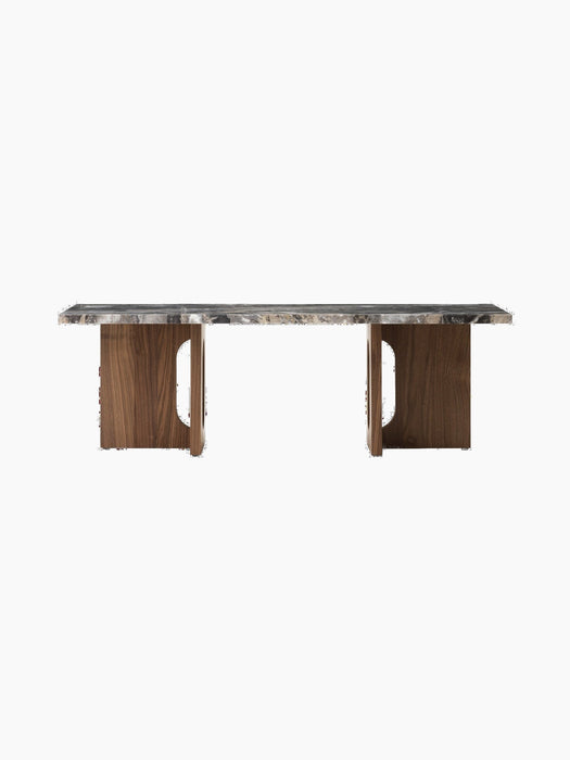 Front view of the Androgyne Lounge Table with a Grey Galaxy marble top and a dark walnut wood base on a black background.