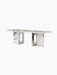 Androgyne Lounge Table in Calacatta Viola marble, with a rectangular top and two wide legs with distinctive oval cutouts.