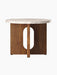 Androgyne Side Table, Ø50, with a round, light-veined Kunis Breccia stone top and a walnut base with a central oval cutout.