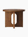 Front view of the Androgyne Side Table, Ø50, in walnut. The table features a round top and a base with a central oval cutout.