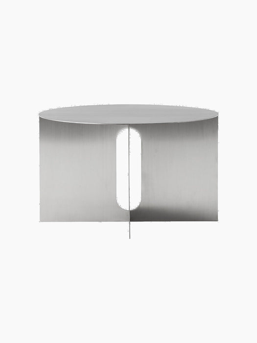 Front-on view of the Androgyne Side Table Ø63 base in brushed steel, featuring a cylindrical shape with a pill-shaped cutout.