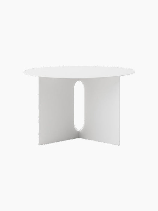 Front view of the ivory Androgyne Side Table Ø63 with a round top and a base made of three panels with oval cutouts.
