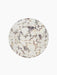 A top-down view of the round Androgyne Side Tabletop in Calacatta Viola marble, showcasing its white and rich purple veins.
