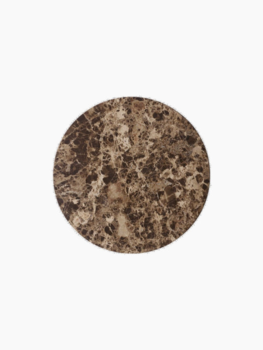 Overhead view of the circular Androgyne Side Tabletop in Emperador marble, showing its brown tones and intricate veining.