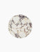 Top-down view of the round Androgyne Side Tabletop in Calacatta Viola marble, showing its bold purple and grey veining.