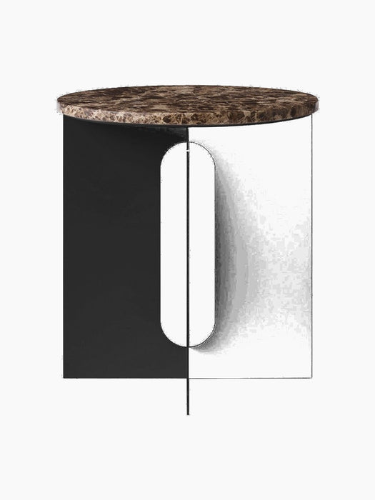 Front view of the Androgyne Side Table, featuring a round Emperador marble top and a black steel base with a cutout detail.