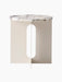 Front view of the Androgyne Side Table, featuring a round Calacatta Viola marble top on a solid ivory base with a cut-out.