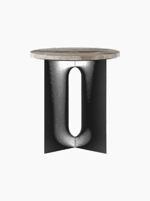 Angled view of the Androgyne Side Table with a Grey Galaxy marble top and black powder-coated steel base with cutouts.