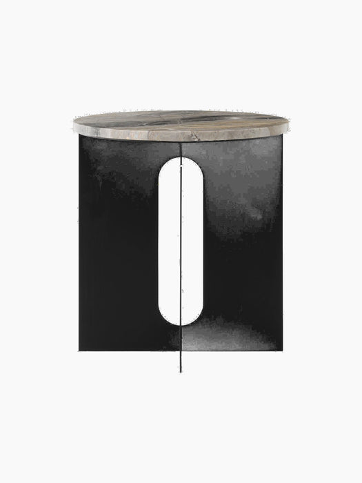 Front view of an Androgyne Side Table with a round Grey Galaxy marble top and a black steel base with oval cutouts.