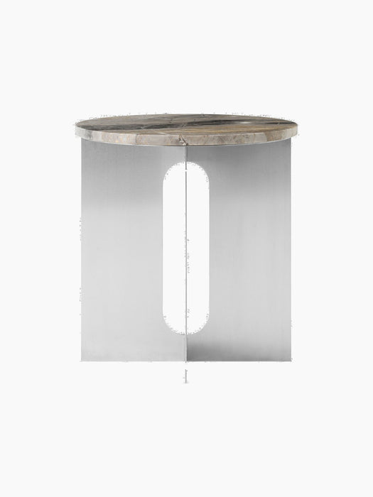 A front view of the Androgyne Side Table, featuring a chrome base with a central cutout and a Grey Galaxy marble top.