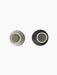 Top-down view of the Bottle Grinder in Ash and Carbon finishes, showcasing the brushed steel lids against a black background.