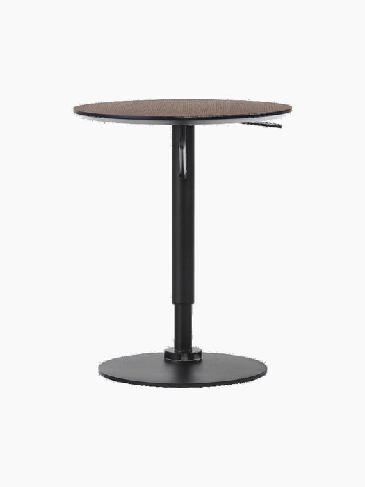 Front view of the Branch Side Table with a dark stained oak top on an adjustable black steel column and circular base.
