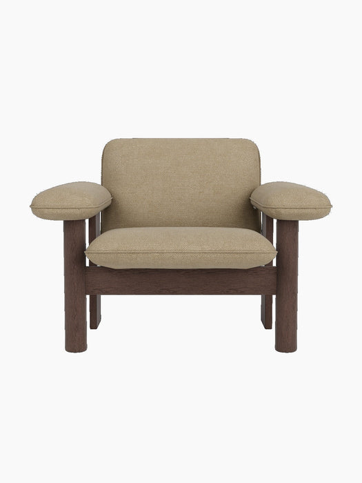 Front view of the Brasilia Lounge Chair, Low Back, featuring a dark stained oak frame and light beige Audo Bouclé upholstery.